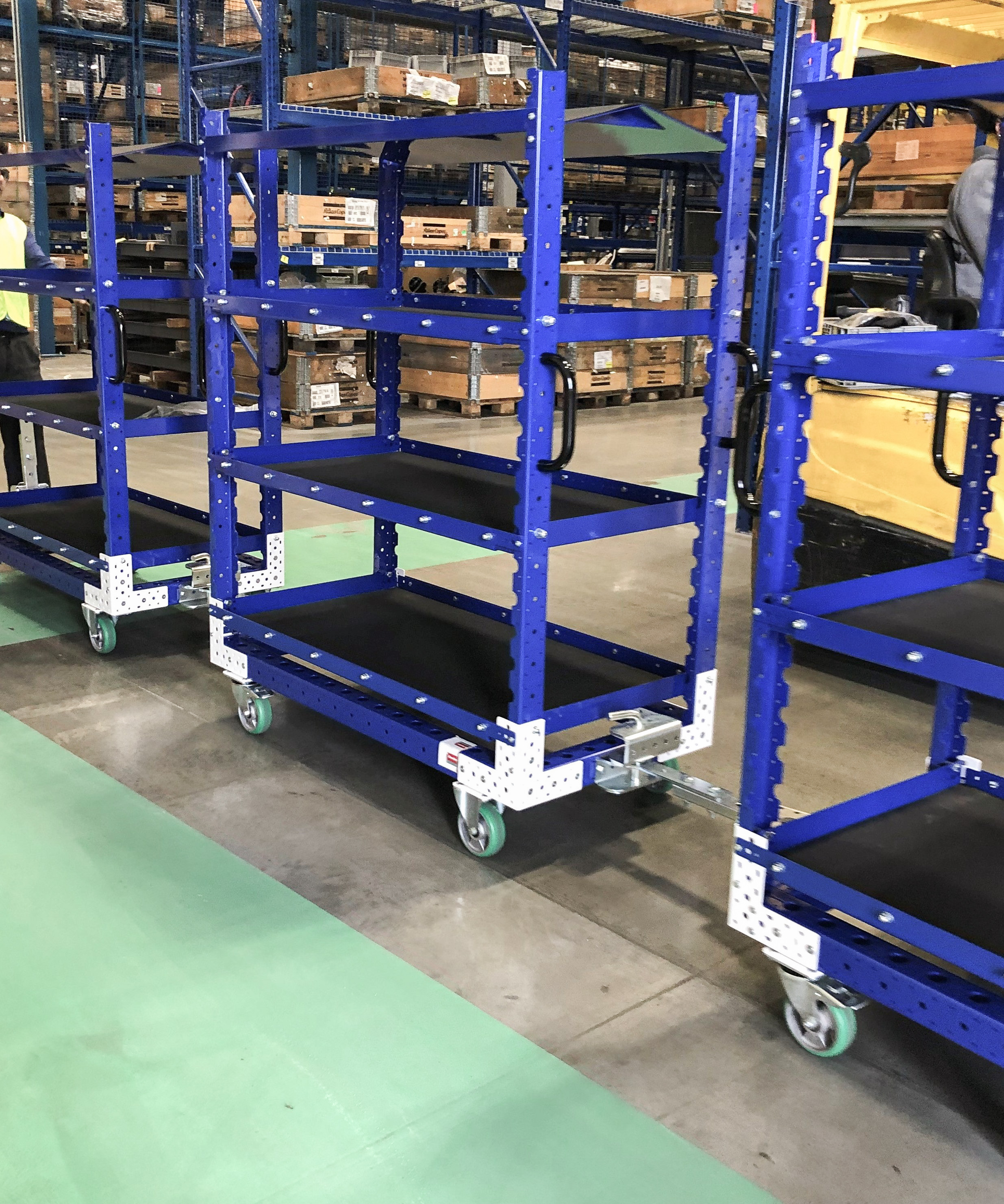 How To Increase Productivity Using Tugger Carts for Material Handling