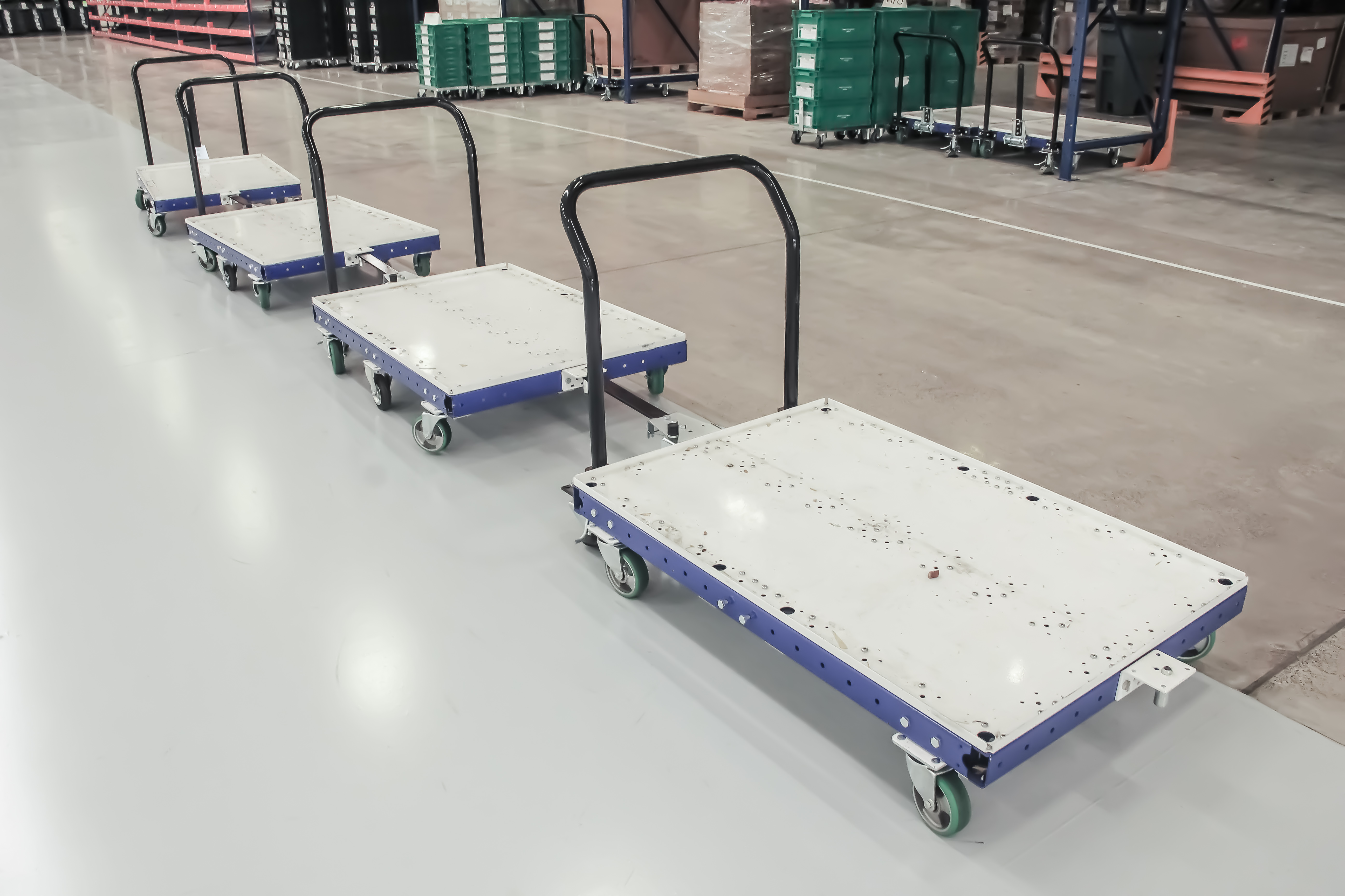 FlexQube tugger carts in a customer factory in Mexico